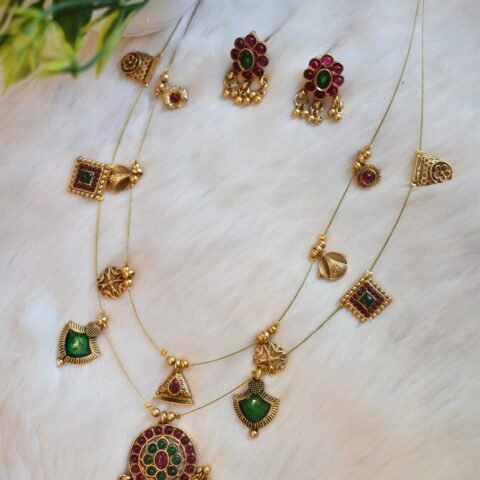 Gemini said Antique Layered Kemp Charm Haram